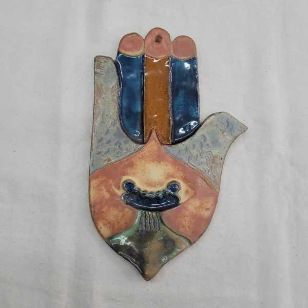 Handmade wall hanging glazed ceramic wall hanging tile Hamsa dove shape designed and made by Ruth Factor. Dimension 12.5 cm X 21 cm approximately.