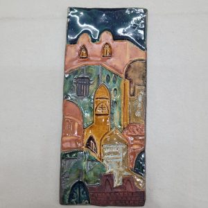 Handmade glazed ceramic Jerusalem houses rectangular tile with different Jerusalem houses in center. Dimension 10 cm X 23 cm approximately.