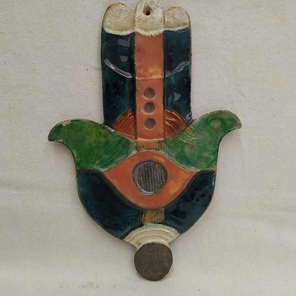 Handmade glazed ceramic wall hanging Tile Hamsa Chamsa Green designed and made by Ruth Factor. Dimension 15 cm X 22 cm approximately.