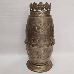 Handmade silver plated Ethrog citron box for the Sukkot feast of Tabernacles.  It is ornate with engravings & foliage.Dimension diameter 4" X 8.25".  
