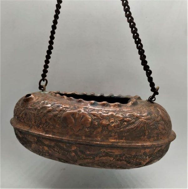 Vintage Copper Oil Lamp . Vintage handmade hanging oil lamp copper with hand hammered and engraved designs around lamp. Made in the middle East.