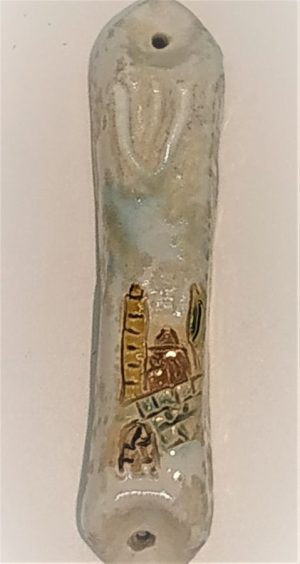 Mezuzah Ceramic Jerusalem DarHandmade ceramic Mezuza by Y. Dar. She Designed the ceramic Mezuza with King David tower engraves on.Dimension 2.2 cm X 11 cm.