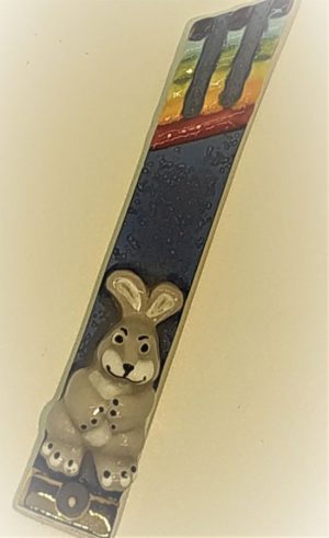 Handmade Mezuzah fine ceramic glazed with rabbit & rainbow. Dimension 1.8 cm X 12 cm approximately.
