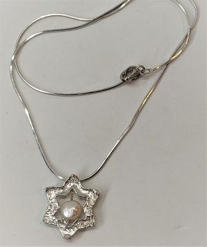 Silver Magen David Star Pendant Pearl handmade contemporary star with chain. The jeweler has fused the star and set a pearl.