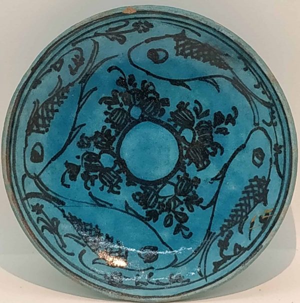 Glazed Ceramic Saucer 4 FishesVintage handmade glazed blue ceramic saucer made in Persia early 20th century..Dimension diameter 12.3 cm X 3.2 cm.