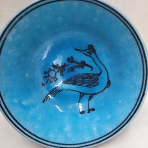 Vintage handmade blue glazed ceramic peacock bowl made in Middle East early 20th century. Dimension diameter 12.8 cm X 8 cm .