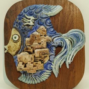 Handmade Ceramic Prophet Jona's Fish describing Jonas fish & Jaffa the city where Jonas lived on a wood backing.