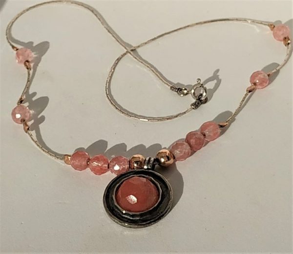 Necklace Sterling Silver Rosequartz handmade. Handmade sterling silver necklace set with Rose quartz stone and gold beads.