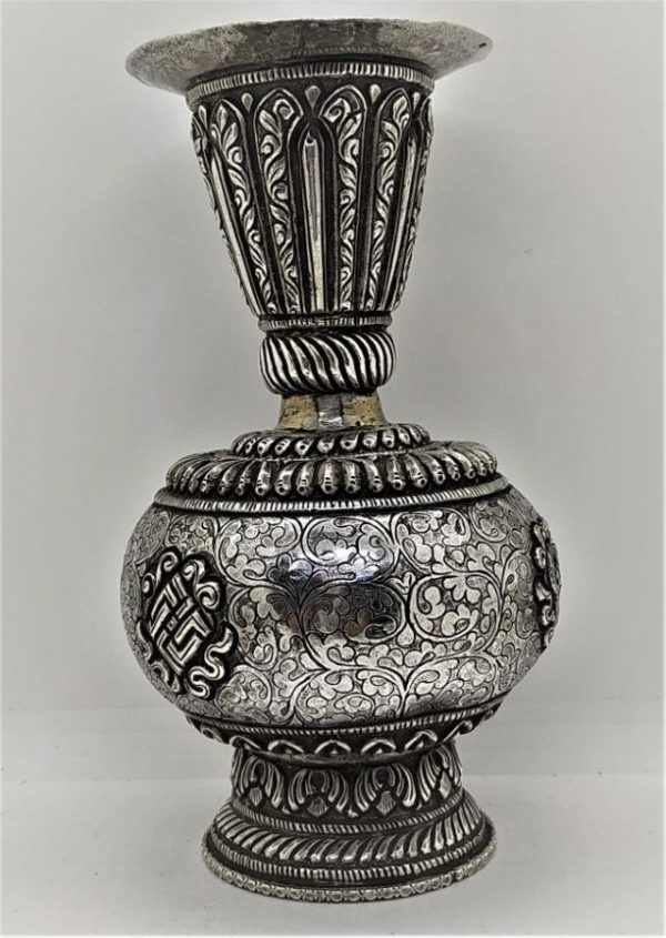 Vintage Silver Vase Foliage Engravings handmade in the middle East early 20th century. Handmade silver vase with foliage designs.