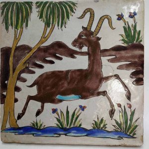 Vintage glazed ceramic tile deer in mating position. Handmade glazed ceramic tile vintage made in middle East early 19th century.