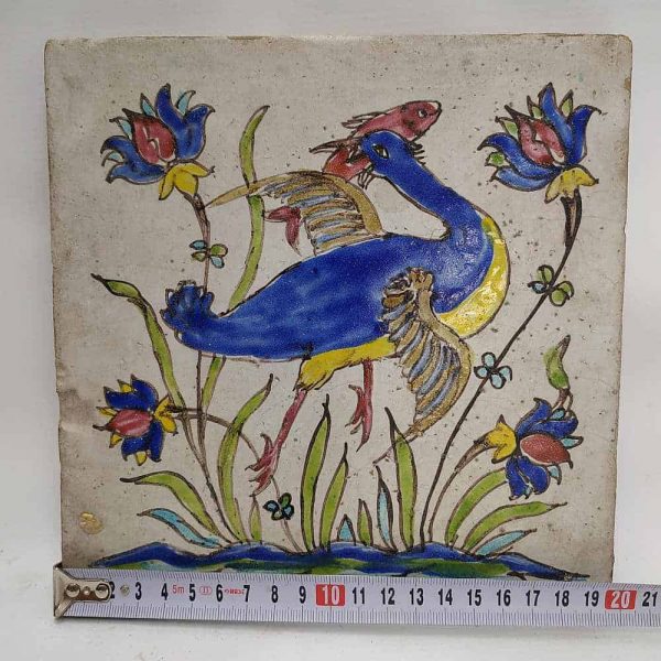 Vintage Ceramic Tile Flamingo fishing.Handmade glazed ceramic tile vintage made in middle East 19th century. A flamingo bird catching her fish for dinner.