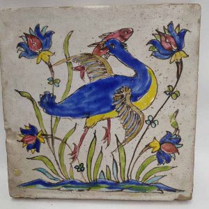 Vintage Ceramic Tile Flamingo fishing.Handmade glazed ceramic tile vintage made in middle East 19th century. A flamingo bird catching her fish for dinner.
