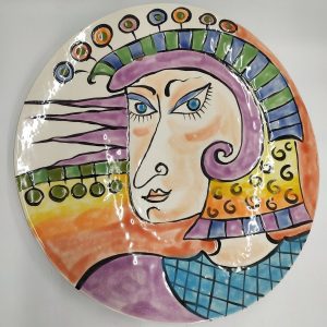 Ceramic Dish Ulshanski Queen handmade. An original handmade glazed ceramic dish with a queen face. Dimension diameter 37.5 cm approximately.