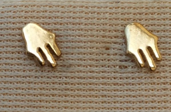 Handmade 14 carat gold earrings studs Hamsa Chamsa cut out miniature size design . Dimension 0.6  cm X 0.35 cm approximately.