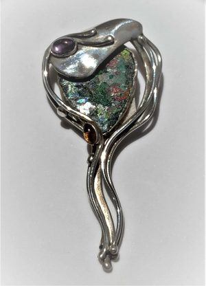 Roman Glass Silver Pendant and can be used as a pin as well , handmade by Y. Perez. Dimension 3.4 cm X 7.1 cm X 1 cm approximately.