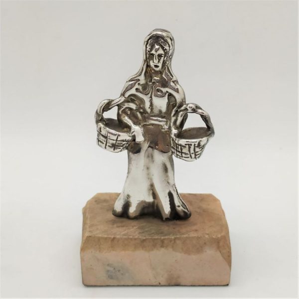 Handmade sterling silver sculpture of Rebecca carrying  two full water buckets for Eliezer and his ten camels carrying gifts and goods. 