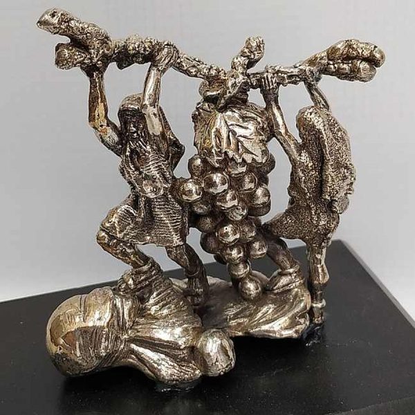 Silver Sculpture Joshua Caleb carrying the grape branch while spying the Holy Land. Dimension silver sculpture 7.7 cm X 6.9 cm X 3.8 cm.