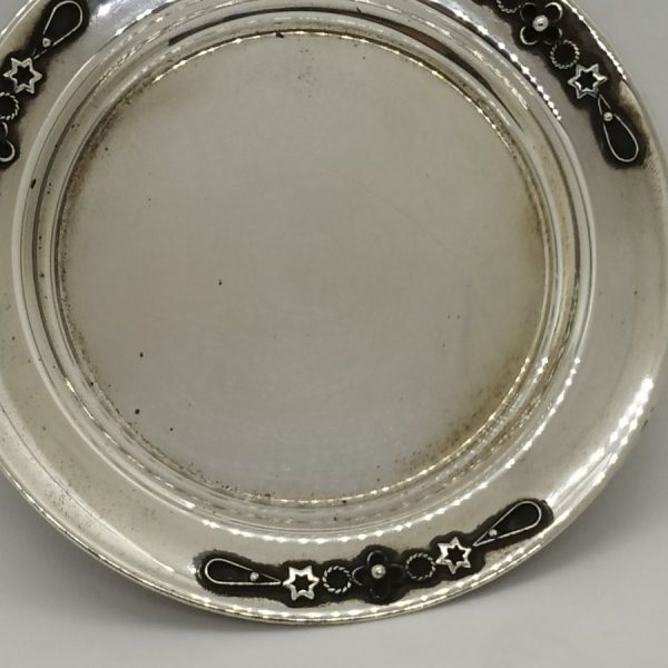 Silver Kiddush Cup Saucer handmade. Handmade sterling silver Kiddush cup saucer made in Israel. It is hand Yemenite filigree designs around saucer edge.