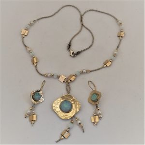 Silver Necklace And Earrings matching set. Handmade sterling silver necklace and earrings matching set with 14 carat gold  and genuine Opal stone and beads.