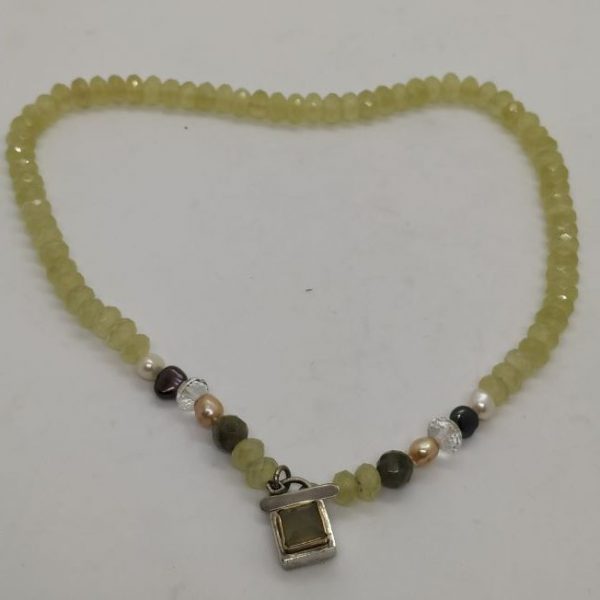 Faceted Yellow Agates Necklace with white and black pearls, crystals and green Agates. Dimension diameter of yellow agate 0.8 cm , length 45 cm.