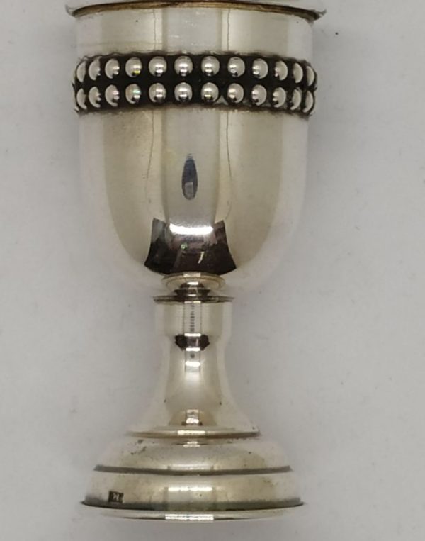 Silver Kiddush Cup Pearls two raw around. Small wine cup silver Kiddush cup pearls beads ,two raw around cup. Dimension diameter 3.7 cm X 7.2 cm.
