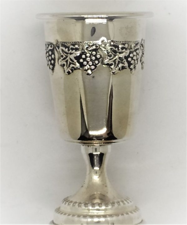 Silver Schnapps Cup Grapes handmade. Sterling silver Schnapps cup grapes designs embossed all around cup. Dimension diameter 4  cm X 7.5 cm approximately.