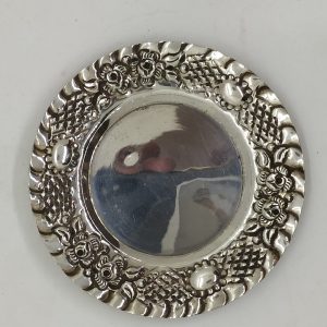 Handmade sterling silver Kiddush cup saucer roses embossed designs of roses around edges made in Israel. Dimension diameter 12 cm .