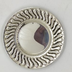 Handmade sterling silver Kiddush cup saucer waves embossed designs giving an illusion of motion around dish edges made in Israel.
