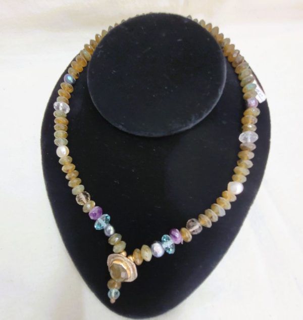 A contemporary beads Labradorite Pearls Amethyst necklace with center pendant silver and 14 carat gold set with Labradorite stone.