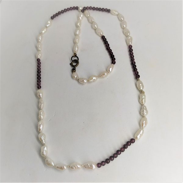Handmade Japanese Garnets rice pearls necklace with round Garnet beads. Dimension Japanese rice pearl 0.7 cm X 0.4 cm X 0.4 cm approximately.