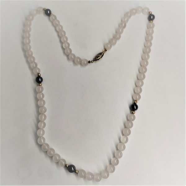 Handmade Rose Quartz Hematite  necklace with round gold beads.Dimension Rose Quartz and Hematite diameter  0.6 cm , length of necklace 49 cm.