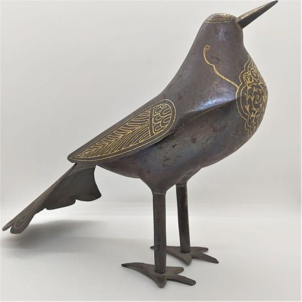 An antique Safavid iron dove with 24 carat gold inlaid designs made in the middle East aged 16th century. Dimension 28 cm X 10 cm X 20 cm.