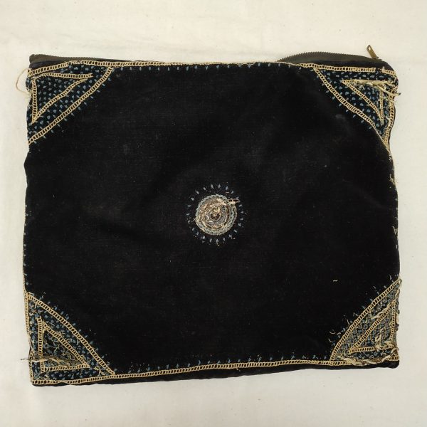 A vintage Talith and bag from the 1940's with hand embroidery silver thread on velvet bags. It belonged to a Rabbi Mordechai ben Moshe.