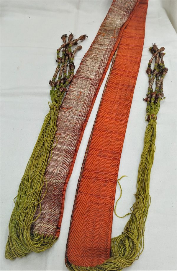 An antique prayer gartel girdle made in the Kurdish parts of Turkey and worn by Kurd Jews. It is made from wool and green colored silk.