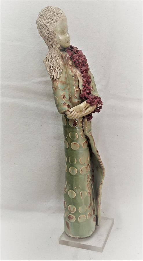 Handmade glazed Ceramic Sculpture Elegant Lady  wearing a flower scarf made by Miri.Dimension 24 cm X 5 cm X 5 cm approximately.