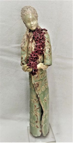 Handmade glazed Ceramic Sculpture Elegant Lady wearing a flower scarf made by Miri. Dimension 24 cm X 5 cm X 5 cm approximately.