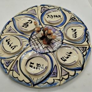Handmade glazed Passover Pesah Seder Dish Ceramic with two Hassid on top made by Denis with on it the ceremonial foods around which the Seder is based on.