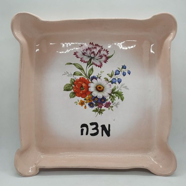 Handmade Matzah Dish Glazed Pottery pink color with many different colors flowers in center. Dimension 24 cm X 25 cm approximately.