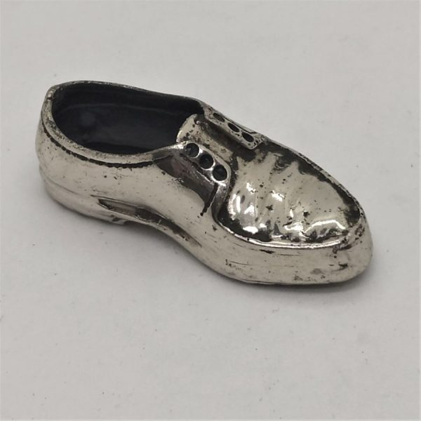 Handmade sterling Silver miniature shoe statue. I have in stock many music instrument like violin , guitar, saxophone and many more.