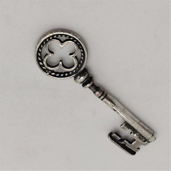 Handmade Sterling silver miniature key given to your beloved to open her loving heart. Dimension 2.9 cm X 1.4 cm X 6.3 cm approximately.