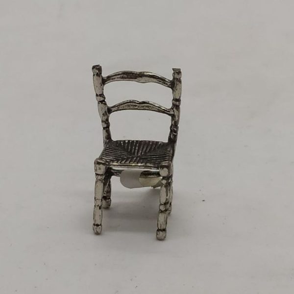 Sterling silver miniature chair sculpture handmade like the old chairs made years ago with straw. Dimension 3.4 cm X1.5 cm X 1.4 cm.