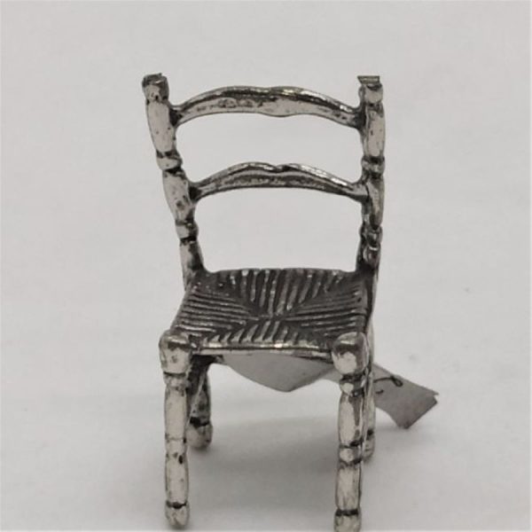 Sterling silver miniature chair sculpture handmade like the old chairs made years ago with straw. Dimension 3.4 cm X1.5 cm X 1.4 cm.