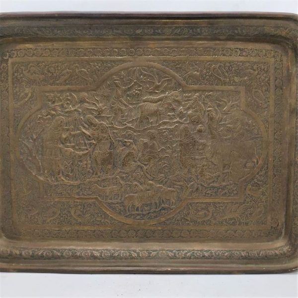Handmade Vintage brass rectangular tray with hand hammered floral designs and the daily nomads life. Women preparing a barbeque.