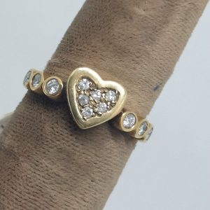 Handmade 14 carat Gold Ring Diamonds Heart shape set with 12 white diamonds weighting 30 pts VS clarity. Dimension 58 European ring size.