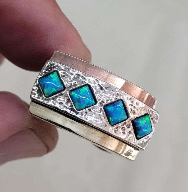 Handmade sterling silver and 14 carat yellow and rose gold silver Opal Ring. Ring size European 59, USA size 9.