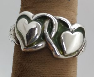 Handmade sterling silver with two enameled hearts ring green color. Dimension 1.2 cm approximately. European finger size 57, USA size 8.