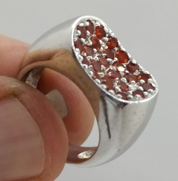 Handmade sterling silver ring set with 24 faceted Garnet ring 0.9 cm X 1.8 cm approximately. European finger size 58, USA size 8.75.