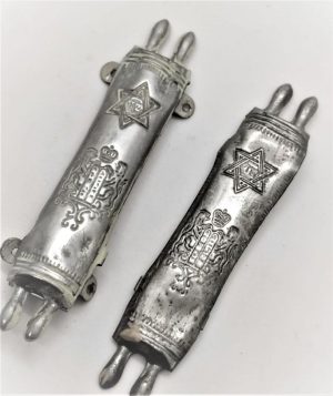 A pair of Mezuzah Vintage Pressed Tin with Torah scroll shape and lions of Judah on it. Dimension 7.5 cm X 1.8 cm approximately.
