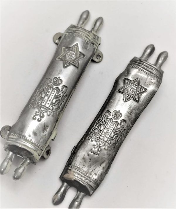 A pair of Mezuzah Vintage Pressed Tin with Torah scroll shape and lions of Judah on it. Dimension 7.5 cm X 1.8 cm approximately.
