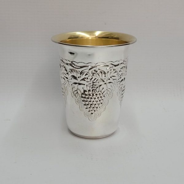 Sterling silver Kiddush goblet grapes leaf cup with grape leaf hand hammered around cup contemporary style diameter 6.8 cm X 7.8 cm approximately.